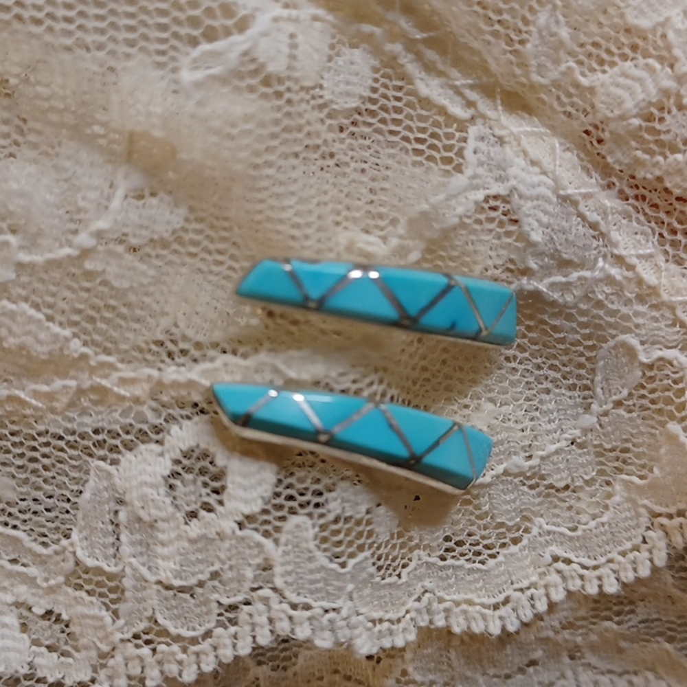 Zuni hallmarked earrings.